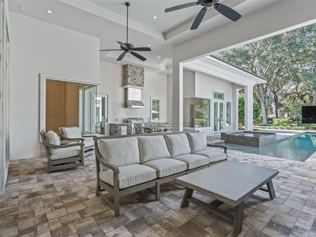 8746 Northwest 31st Lane Road Ocala, FL 34482 - Photo 67 of 89 a living room with furniture and a large window