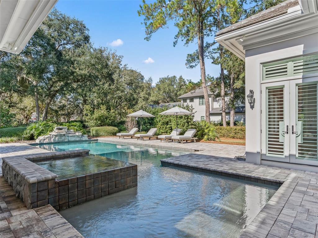 8746 Northwest 31st Lane Road Ocala, FL 34482 - Photo 72 of 89 swimming pool view with a outdoor seating