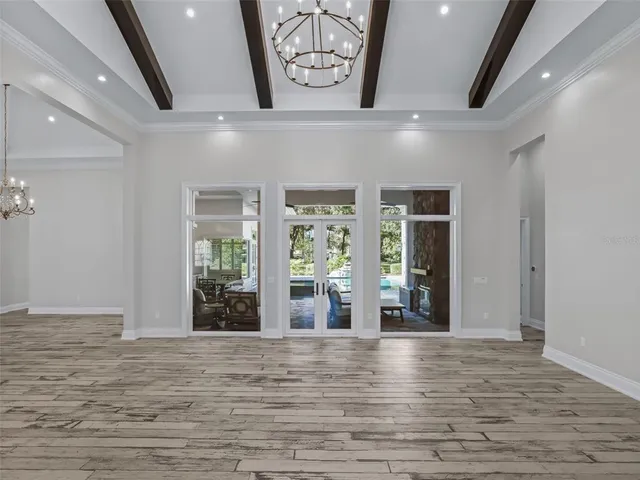 a kitchen with stove and cabinets