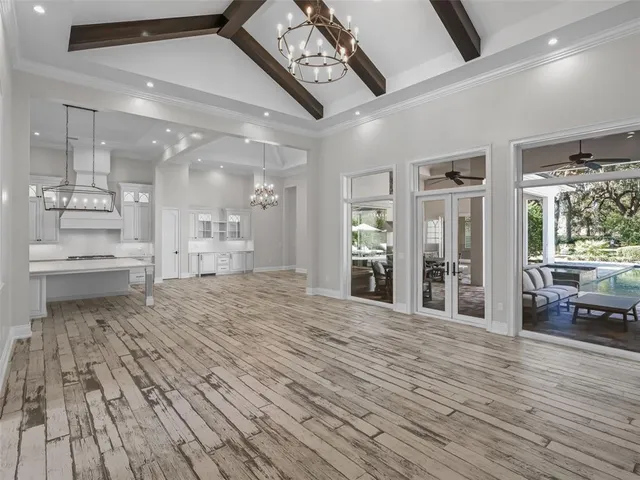 a stove top oven sitting inside of a kitchen