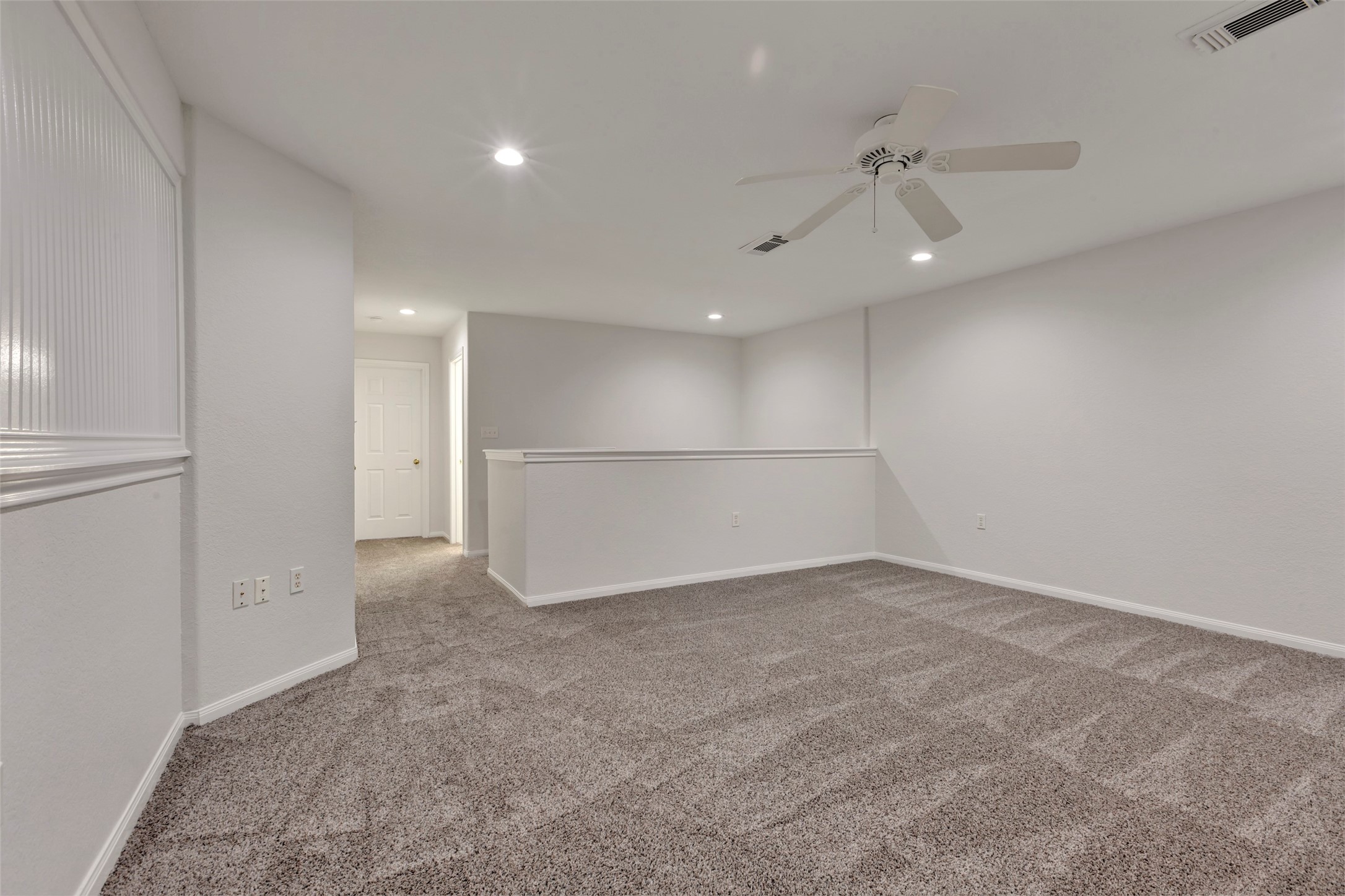770 Hunt Road, Unit 212 Baytown, TX 77521 - Photo 33 of 40 This upstairs room could be a second primary bedroom or a game room.