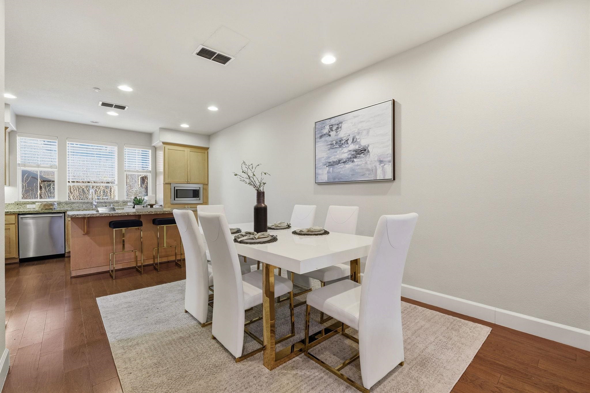 2863 Finca Terrace Fremont, CA 94539 - Photo 13 of 37 a view of a dining room with furniture and wooden floor