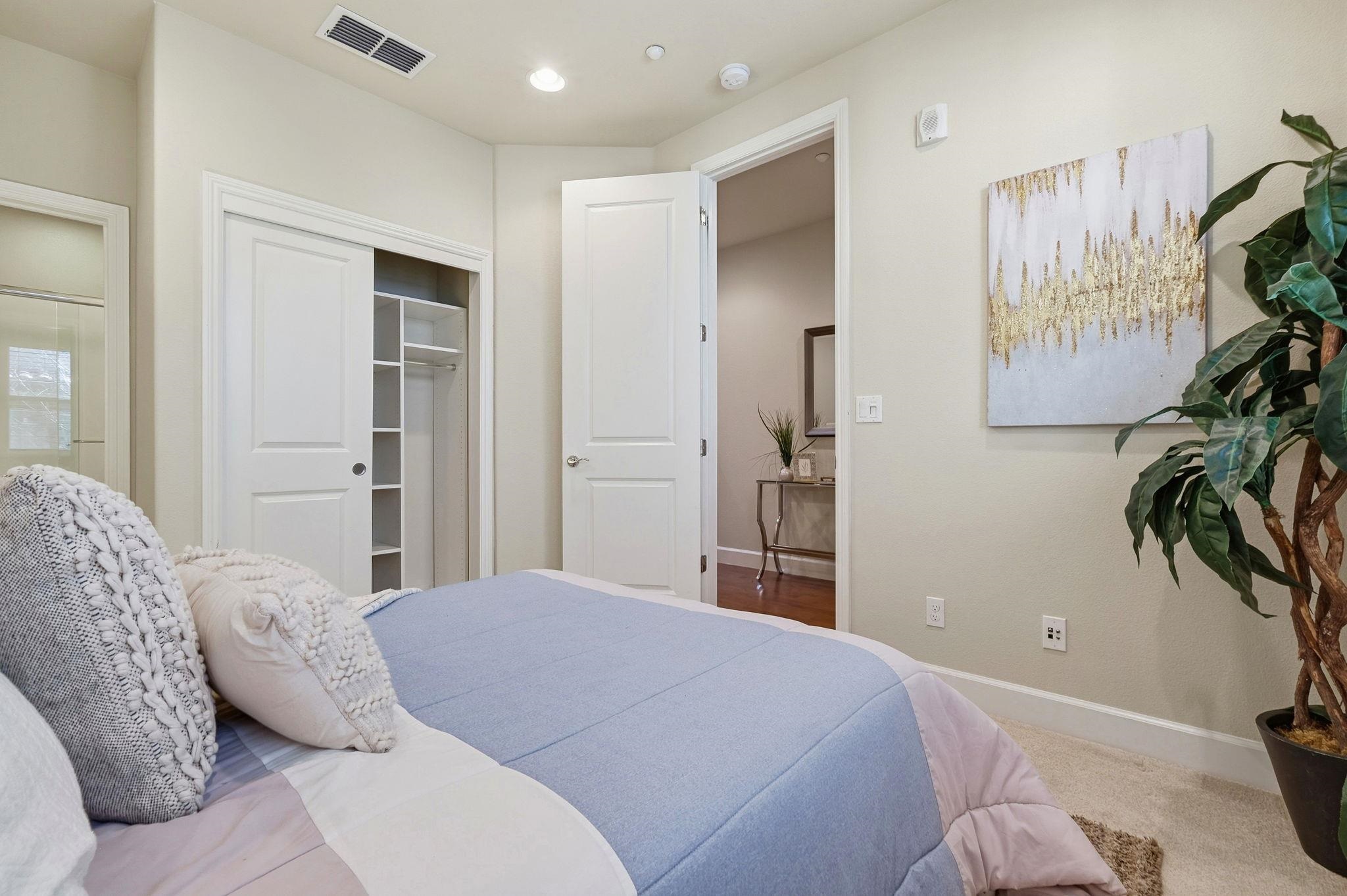 2863 Finca Terrace Fremont, CA 94539 - Photo 16 of 37 a bedroom with a bed and a window