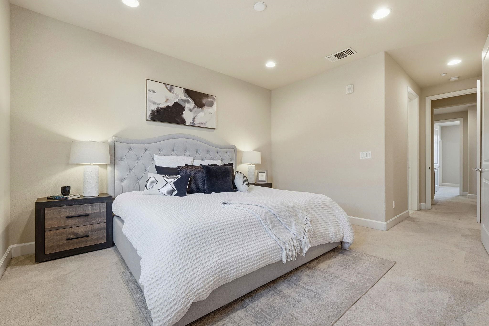 2863 Finca Terrace Fremont, CA 94539 - Photo 19 of 37 a bedroom with a bed and a cabinets