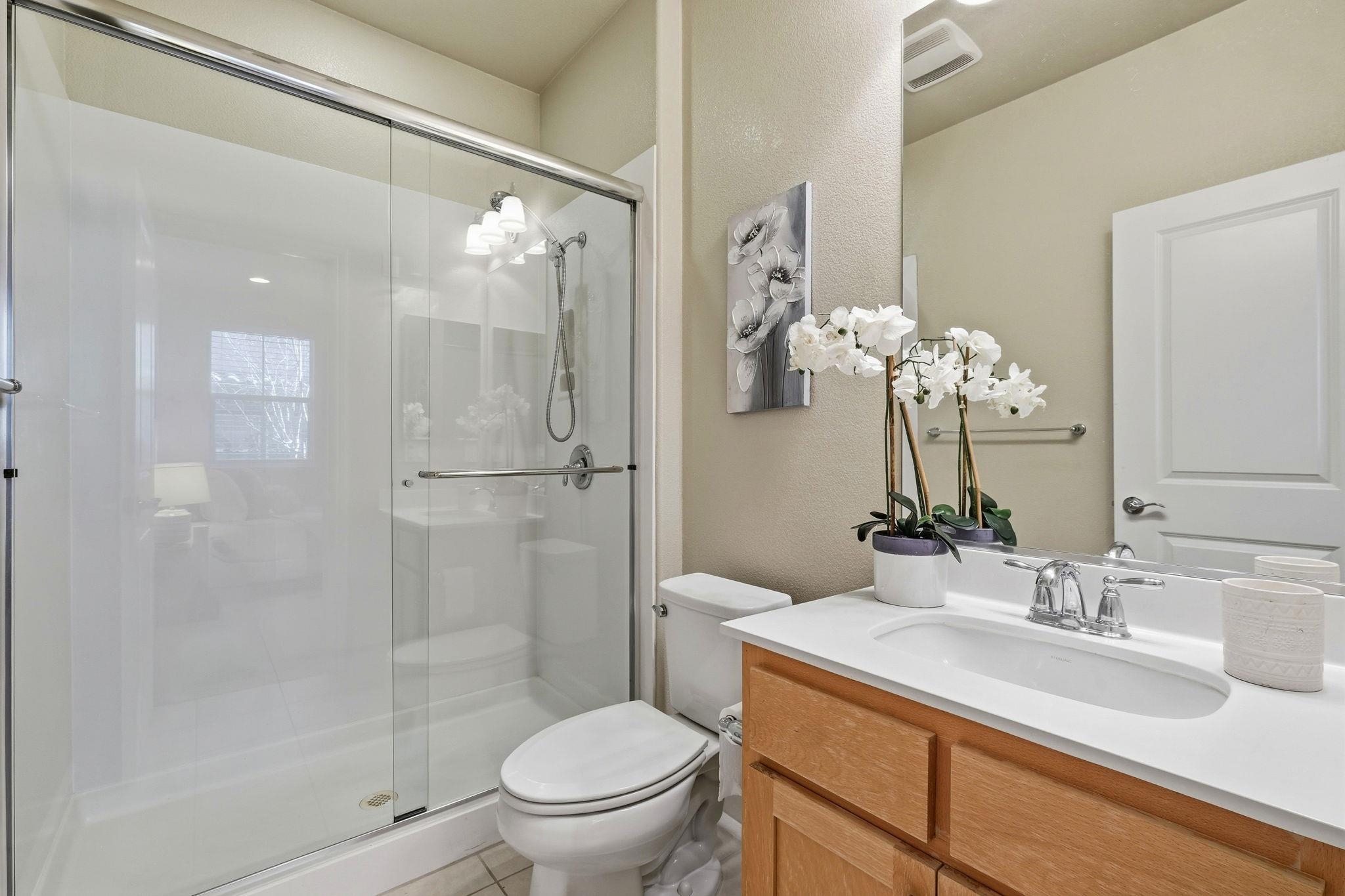2863 Finca Terrace Fremont, CA 94539 - Photo 22 of 37 a bathroom with a sink toilet and shower