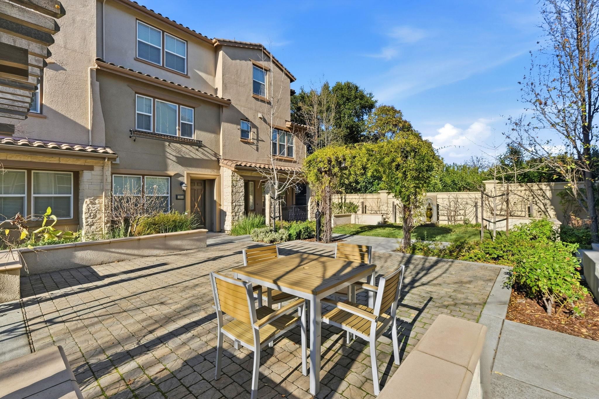 2863 Finca Terrace Fremont, CA 94539 - Photo 35 of 37 a view of a patio with couches table and chairs and potted plants