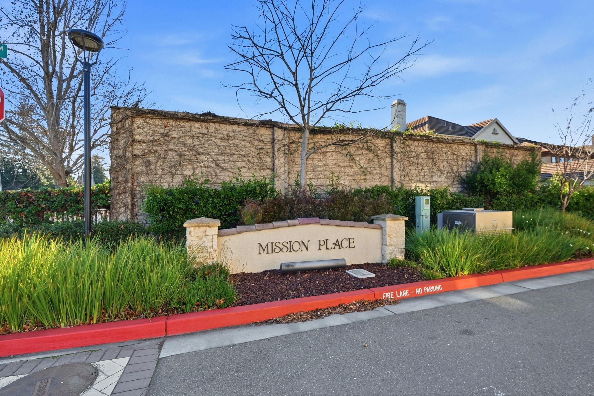 2863 Finca Terrace Fremont, CA 94539 - Photo 37 of 37 a front view of a house with a yard and lake view