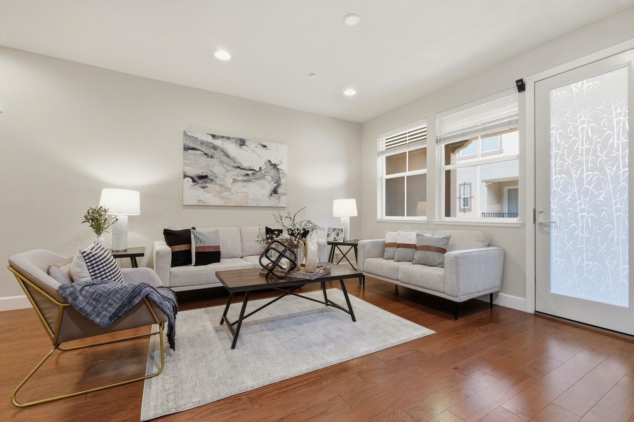 2863 Finca Terrace Fremont, CA 94539 - Photo 7 of 37 a living room with furniture and wooden floor