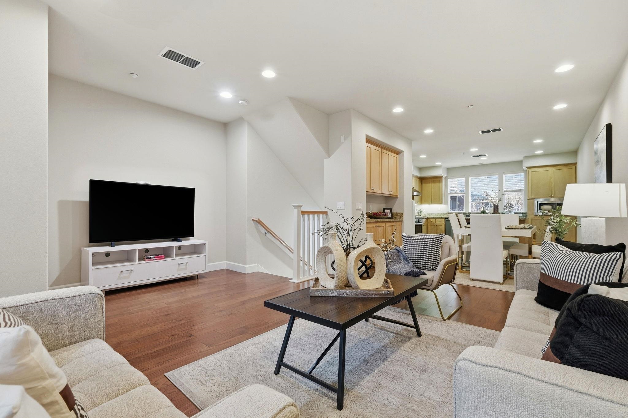 2863 Finca Terrace Fremont, CA 94539 - Photo 8 of 37 a living room with furniture and a flat screen tv