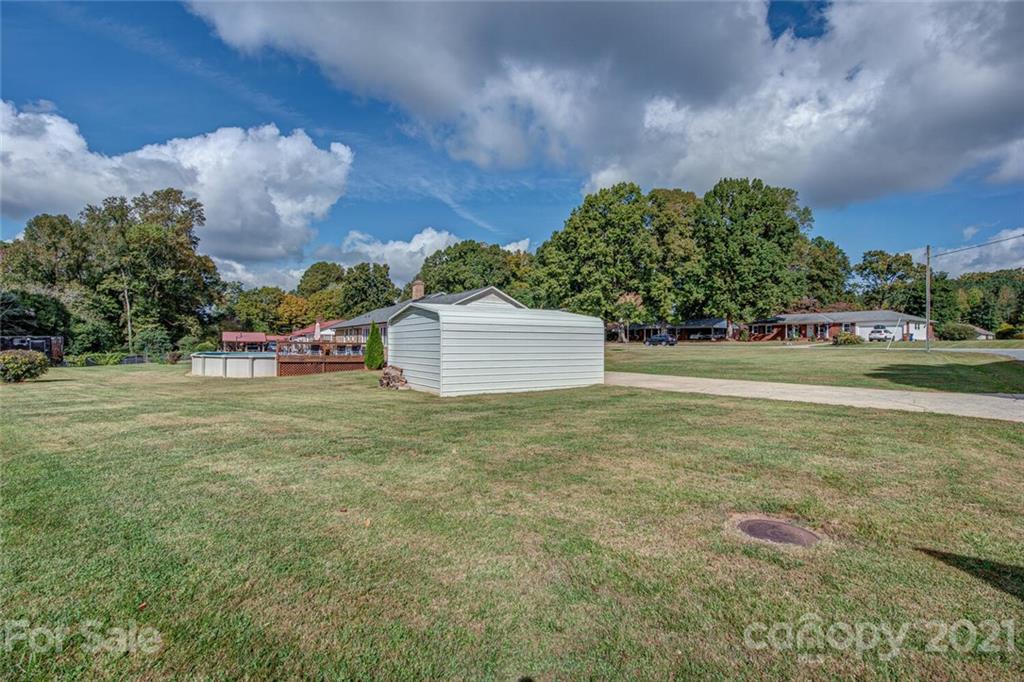 2103 Heavner Road Lincolnton, NC 28092 - Photo 25 of 25 a backyard of a house with lots of green space