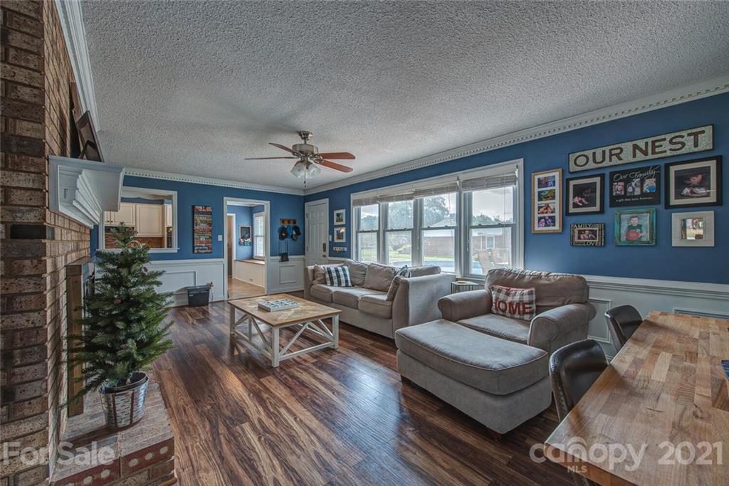 2103 Heavner Road Lincolnton, NC 28092 - Photo 9 of 25 a living room with furniture and a large window