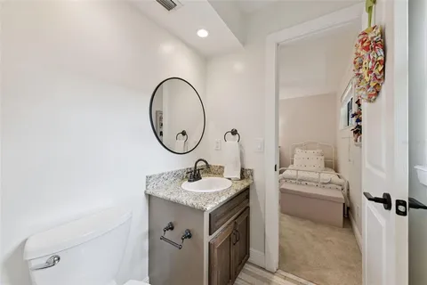a utility room with sink dryer and washer