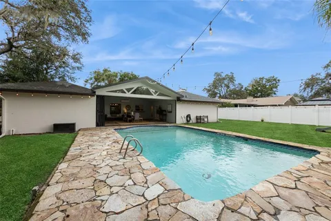 a view of a backyard with green space