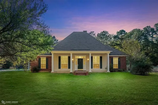 a house view with a garden space
