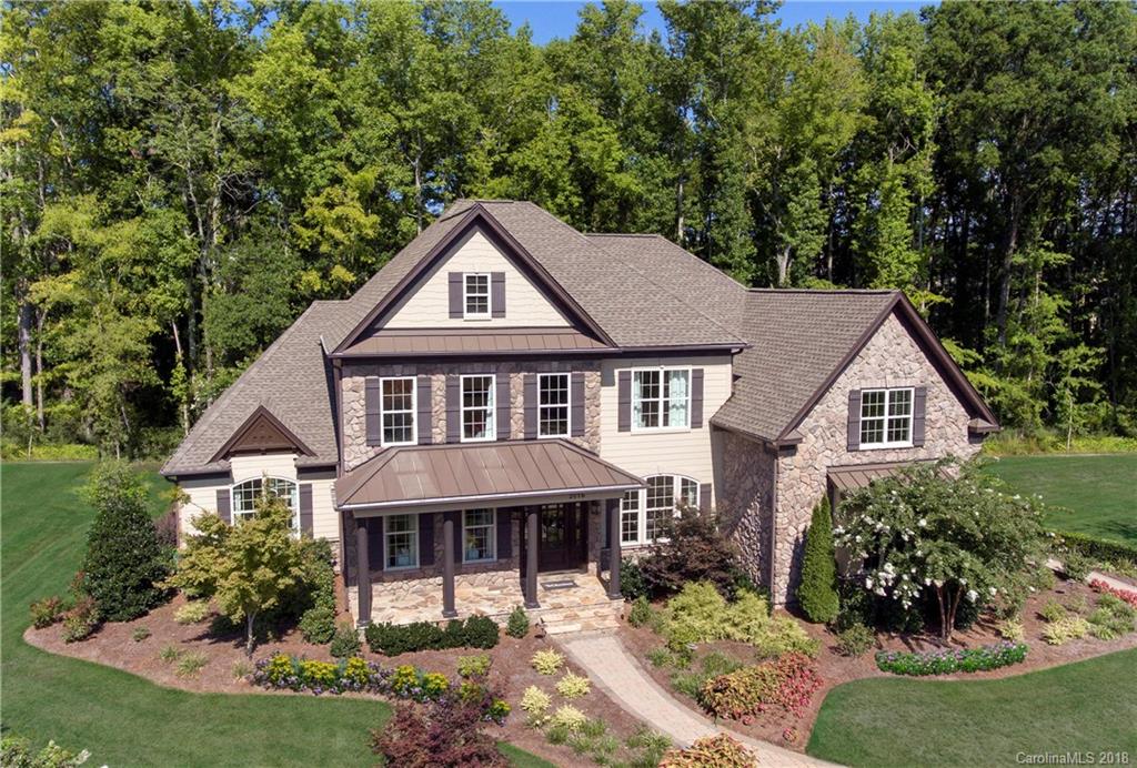 2016 Flowering Peach Road, Unit 68 Marvin, NC 28173 - Photo 13 of 14 a aerial view of a house next to a yard