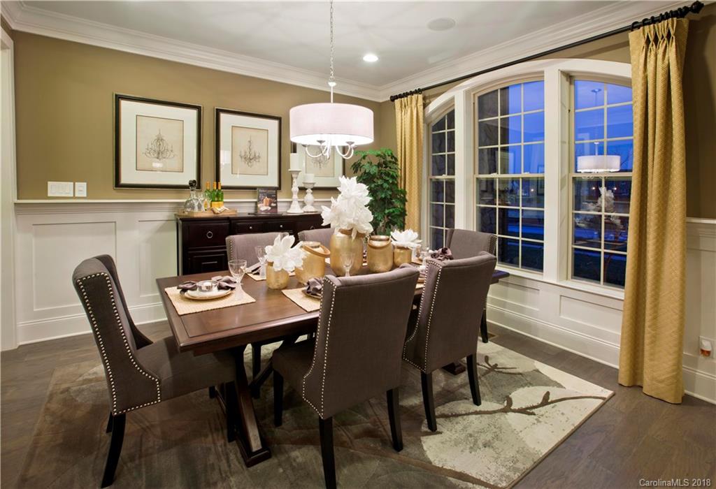 2016 Flowering Peach Road, Unit 68 Marvin, NC 28173 - Photo 5 of 14 a view of a dining room with furniture window and outside view