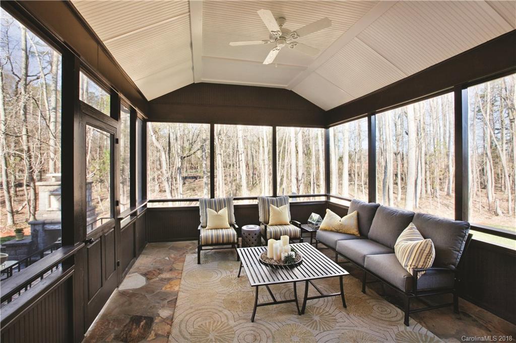 2016 Flowering Peach Road, Unit 68 Marvin, NC 28173 - Photo 6 of 14 a living room with furniture and a large window