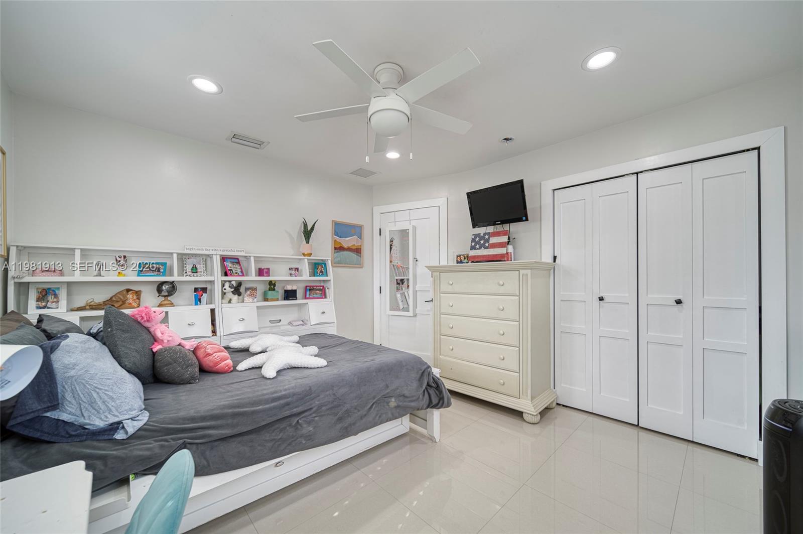 10131 Southwest 108th Street Miami, FL 33176 - Photo 13 of 21 a bedroom with a bed and furniture