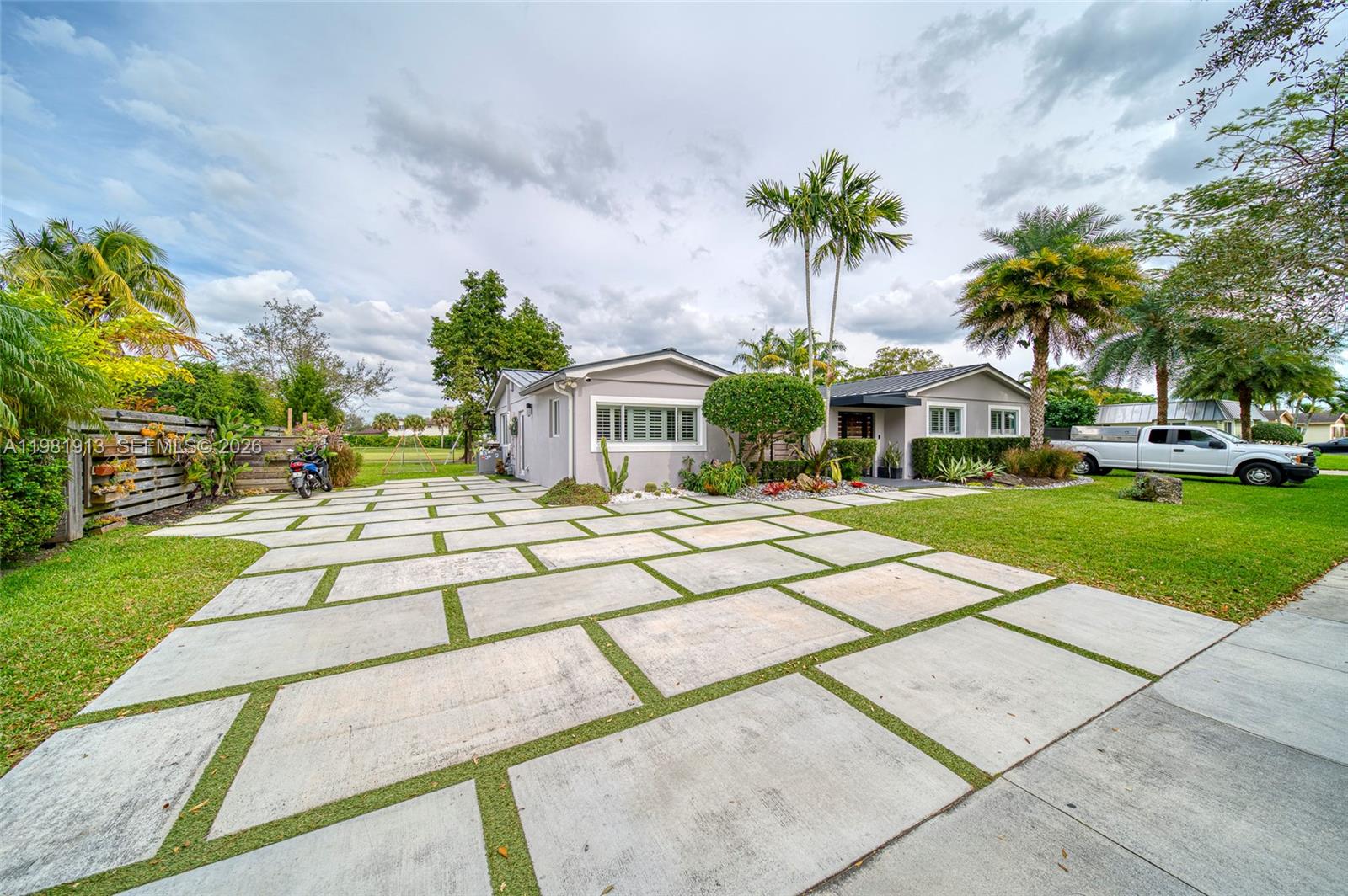 10131 Southwest 108th Street Miami, FL 33176 - Photo 18 of 21 a view of yard with outdoor seating
