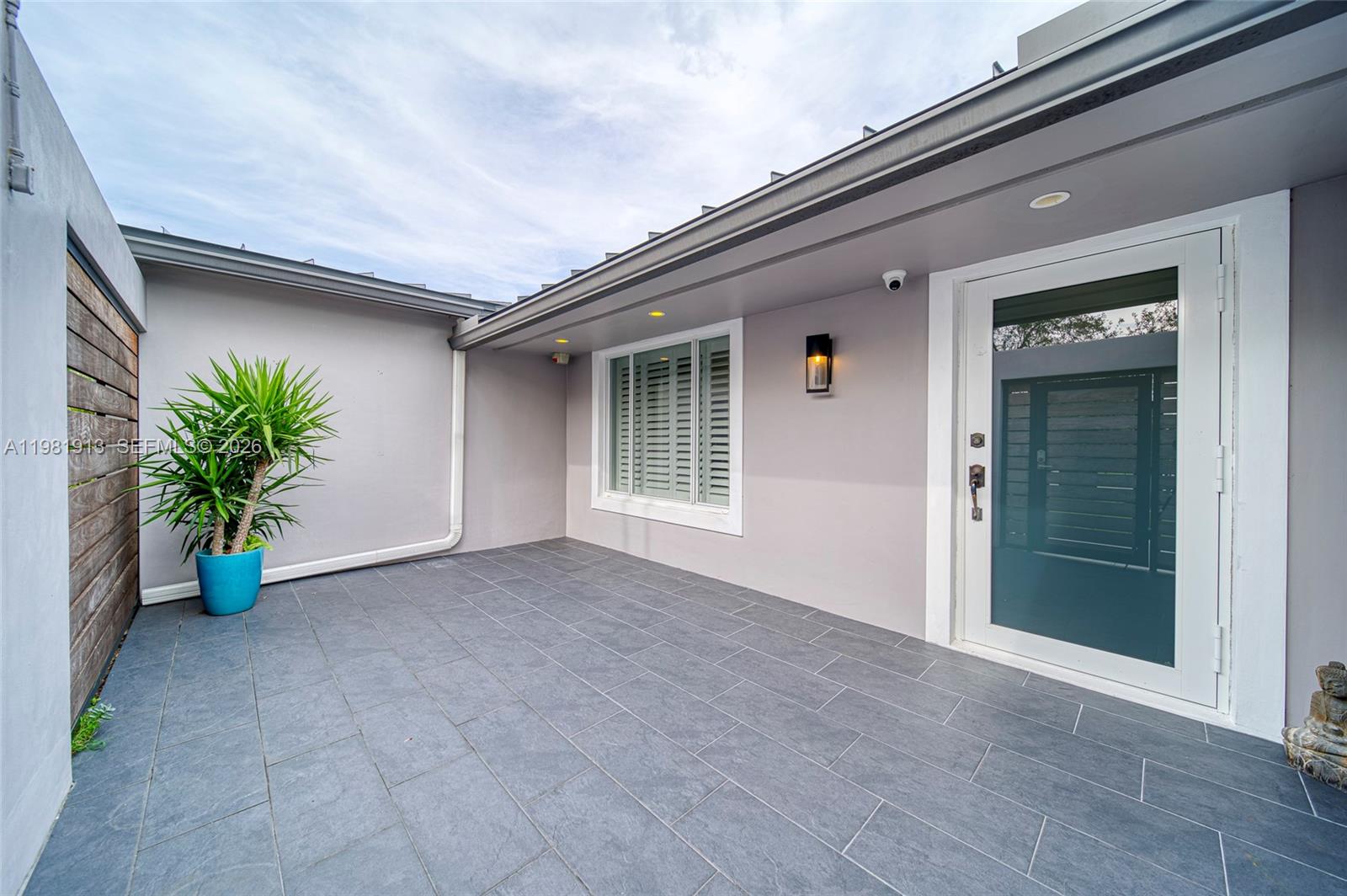 10131 Southwest 108th Street Miami, FL 33176 - Photo 19 of 21 front view of a house