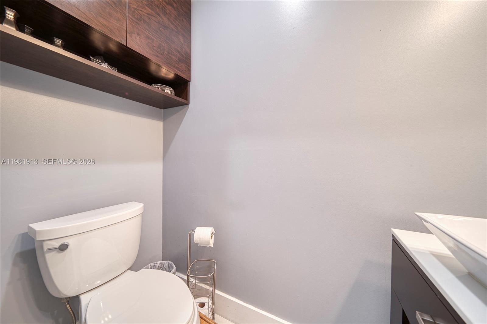 10131 Southwest 108th Street Miami, FL 33176 - Photo 21 of 21 a white toilet sitting next to a white wall
