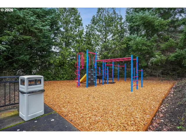 a view of a backyard with a small cabin