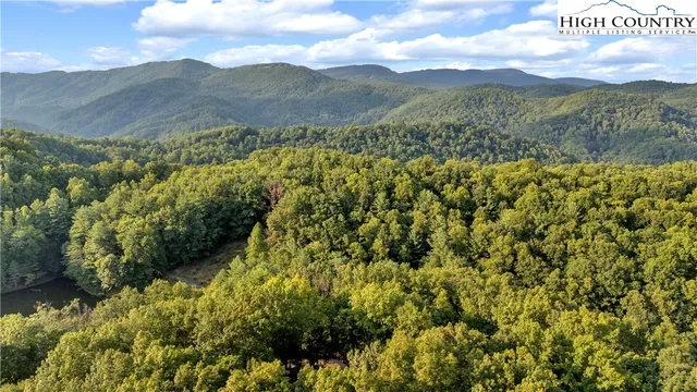 a view of mountain view with mountains in the background