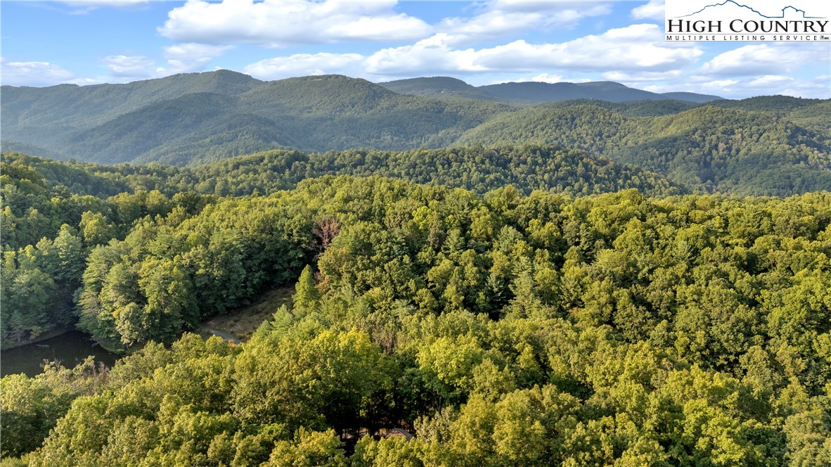 a view of mountain view with mountains in the background