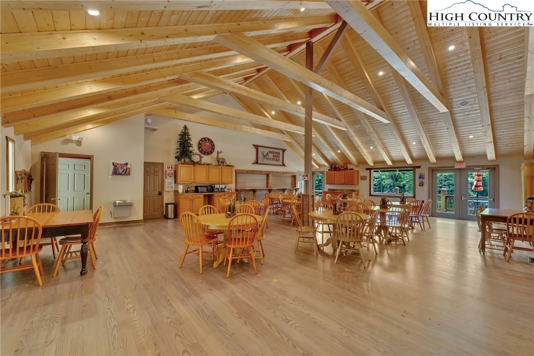 Trout Lake Road Deep Gap, NC 28618 - Photo 12 of 25 a living room with lots of furniture and wooden floor