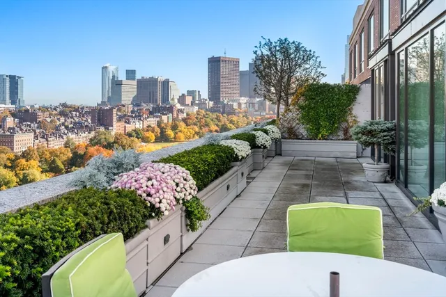 a view of a city with tall buildings