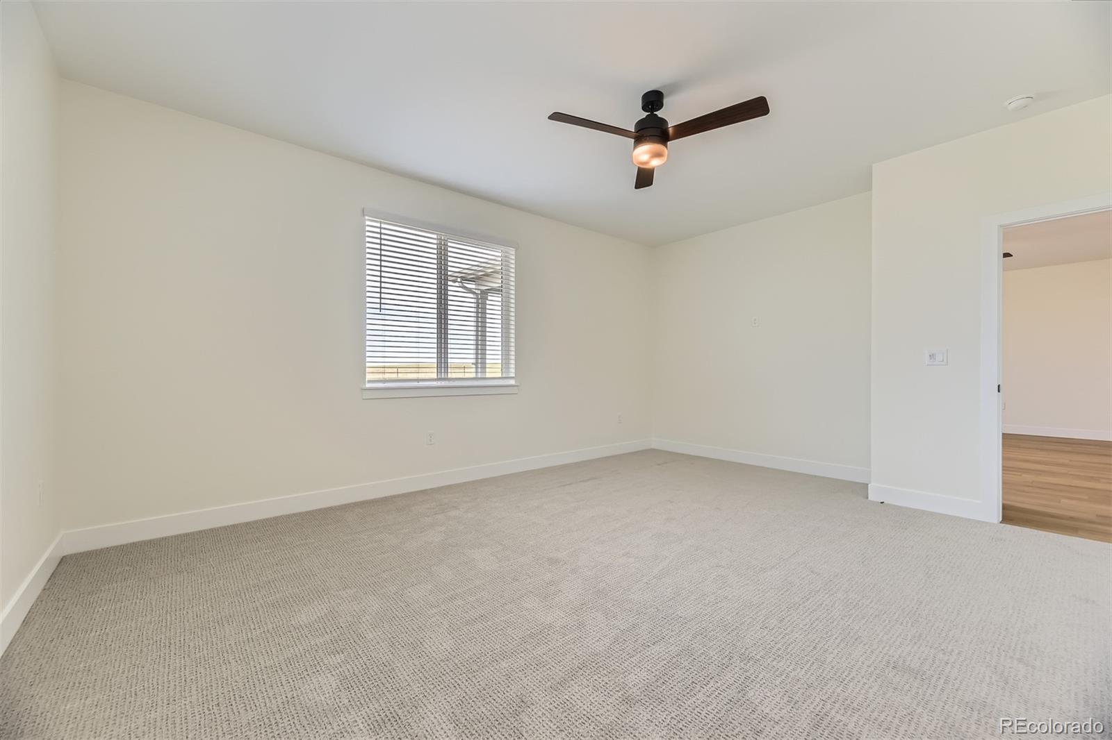 42966 Colonial Trail Elizabeth, CO 80107 - Photo 17 of 29 an empty room with windows