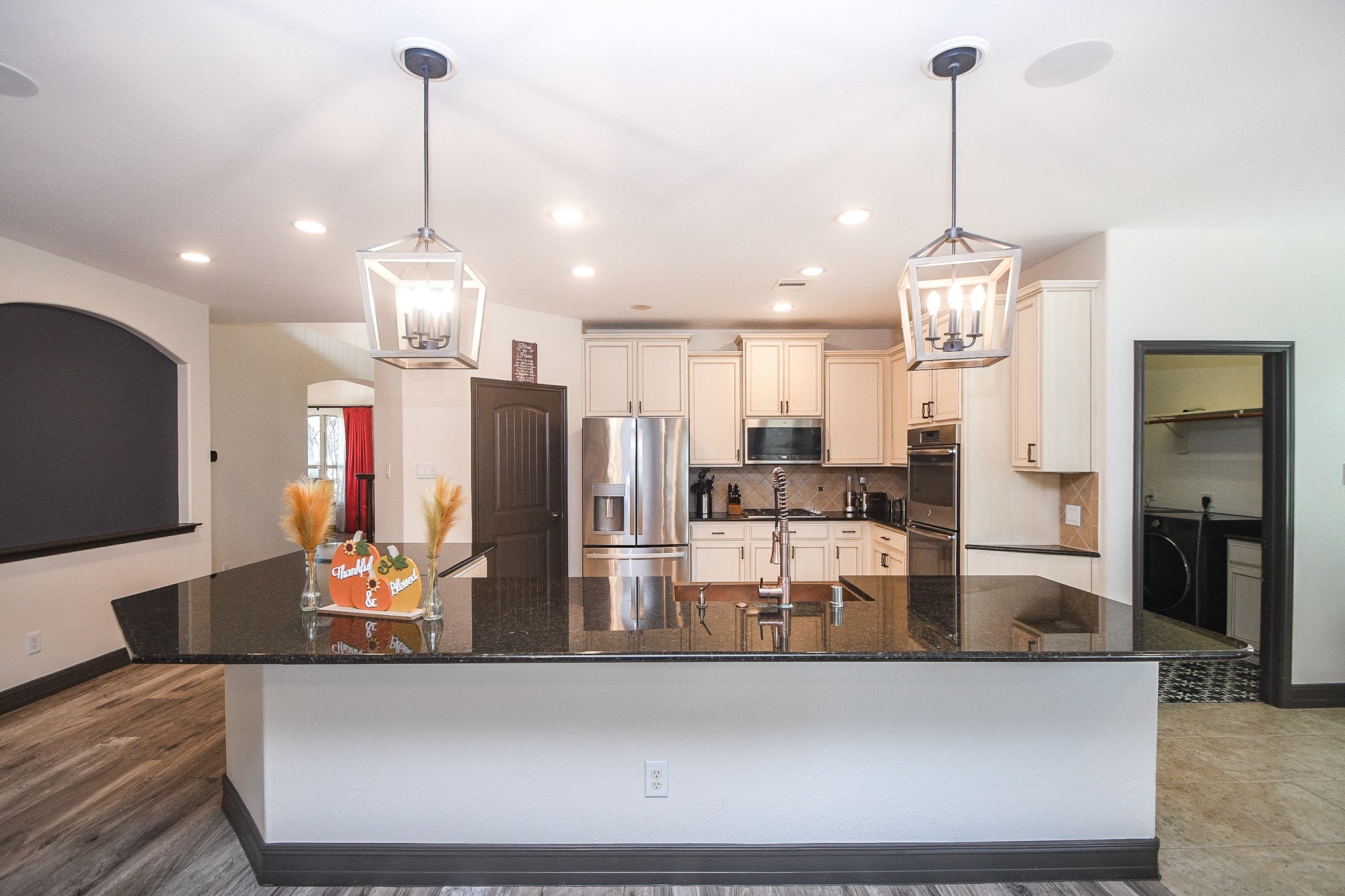 4331 Estes Ridge Lane Katy, TX 77493 - Photo 13 of 42 a view of a kitchen with stainless steel appliances granite countertop a refrigerator a oven and a sink