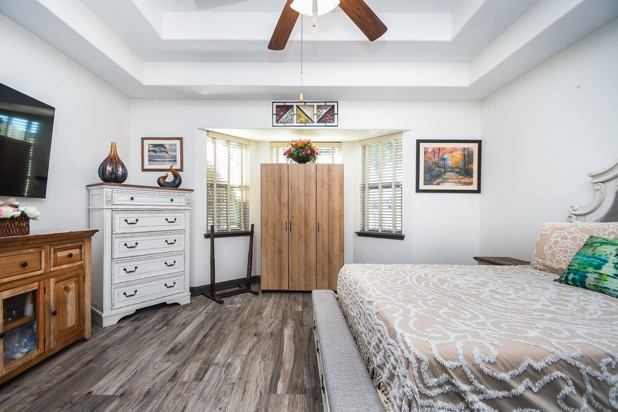 4331 Estes Ridge Lane Katy, TX 77493 - Photo 18 of 42 a bedroom with a bed and a flat tv screen