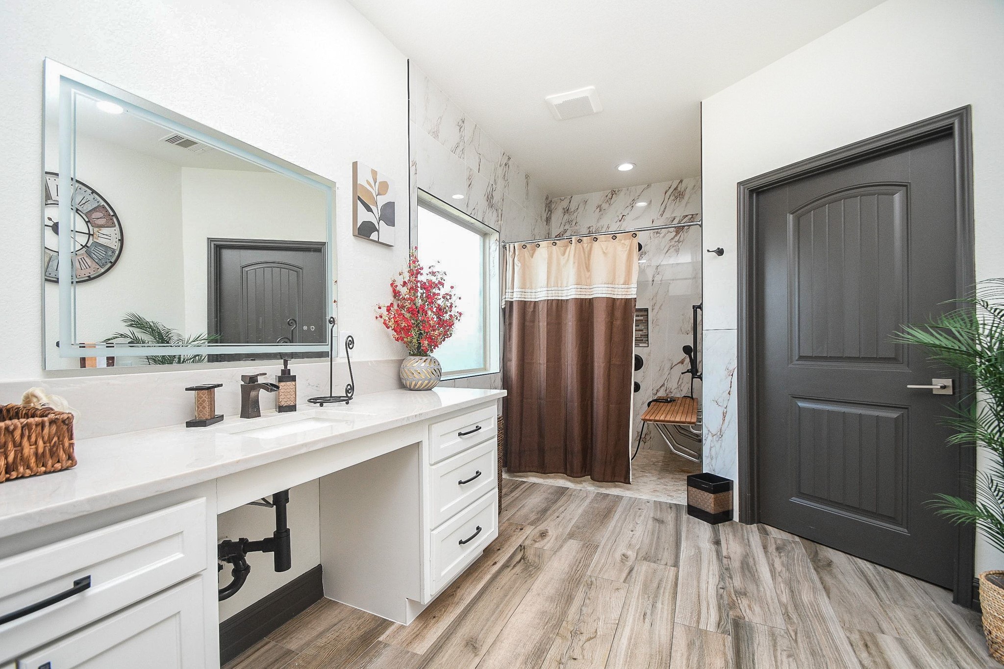 4331 Estes Ridge Lane Katy, TX 77493 - Photo 22 of 42 a spacious bathroom with a double vanity sink mirror and shower