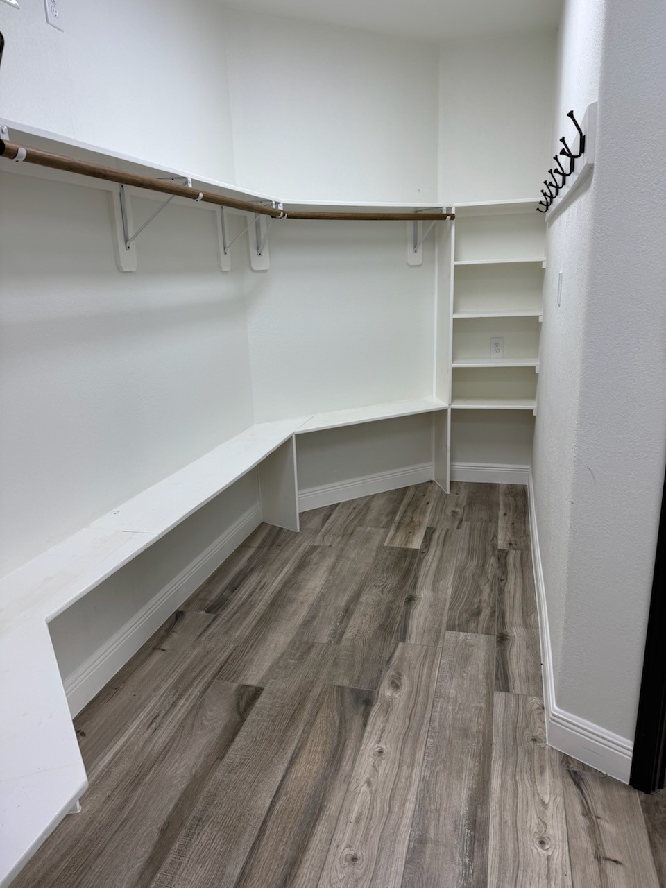 4331 Estes Ridge Lane Katy, TX 77493 - Photo 24 of 42 a view of walk in closet with empty racks
