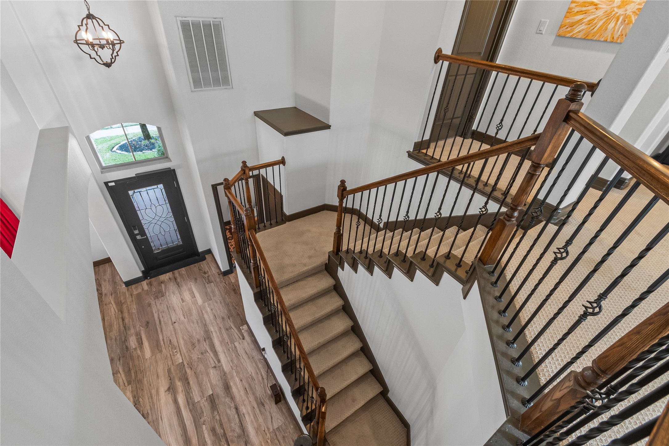 4331 Estes Ridge Lane Katy, TX 77493 - Photo 27 of 42 a view of a staircase with wooden floor and stairs