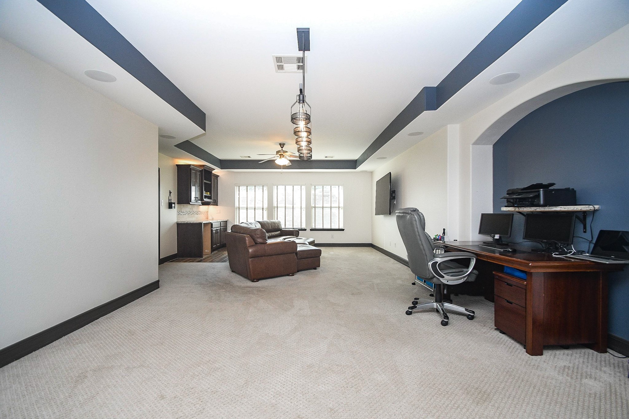 4331 Estes Ridge Lane Katy, TX 77493 - Photo 28 of 42 a workspace with a chandelier