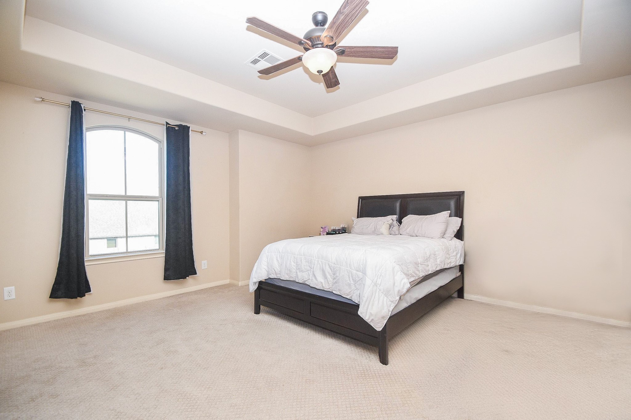 4331 Estes Ridge Lane Katy, TX 77493 - Photo 32 of 42 a bedroom with a bed and window