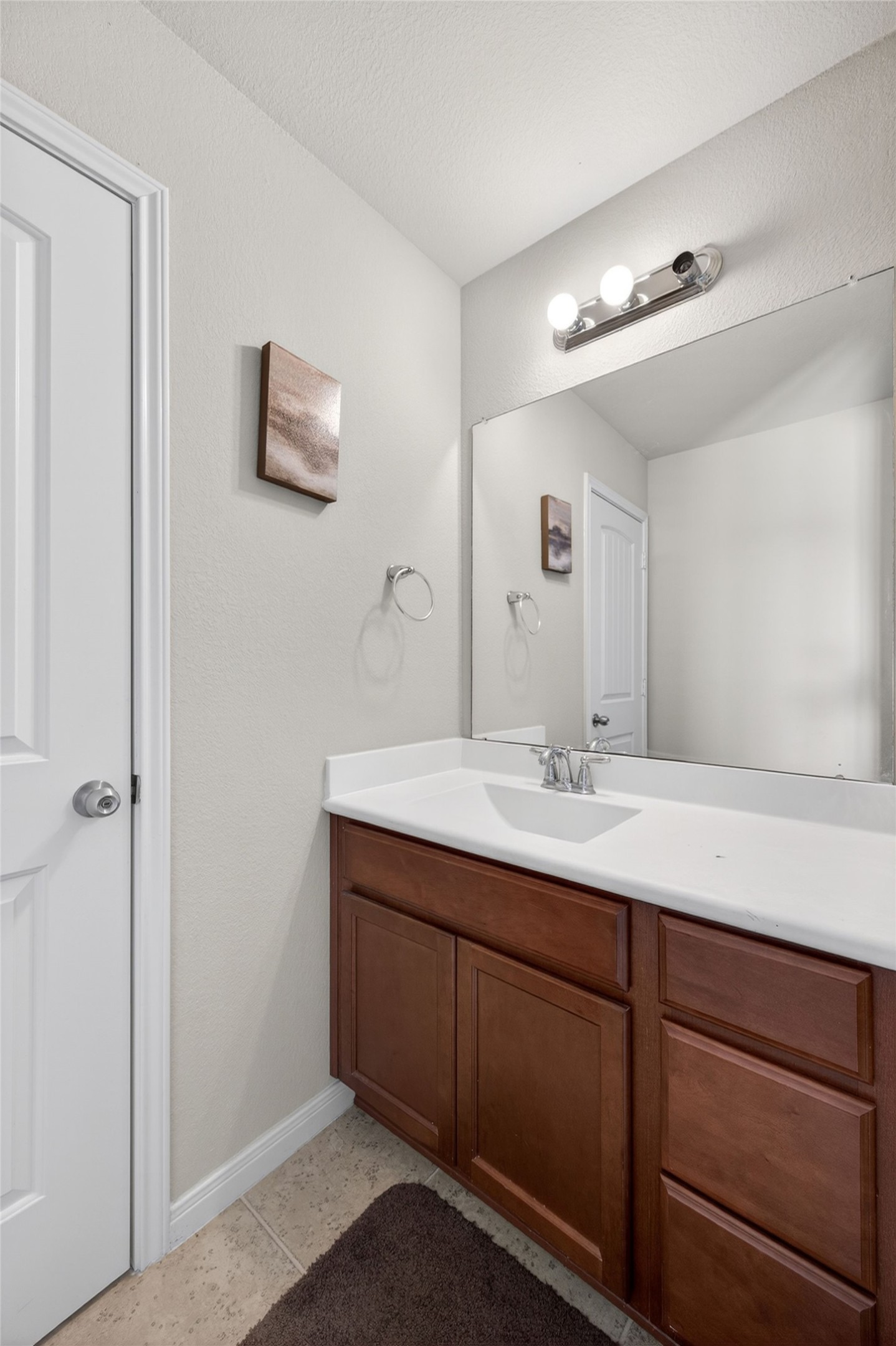 4331 Estes Ridge Lane Katy, TX 77493 - Photo 35 of 42 a bathroom with a granite countertop sink and a mirror