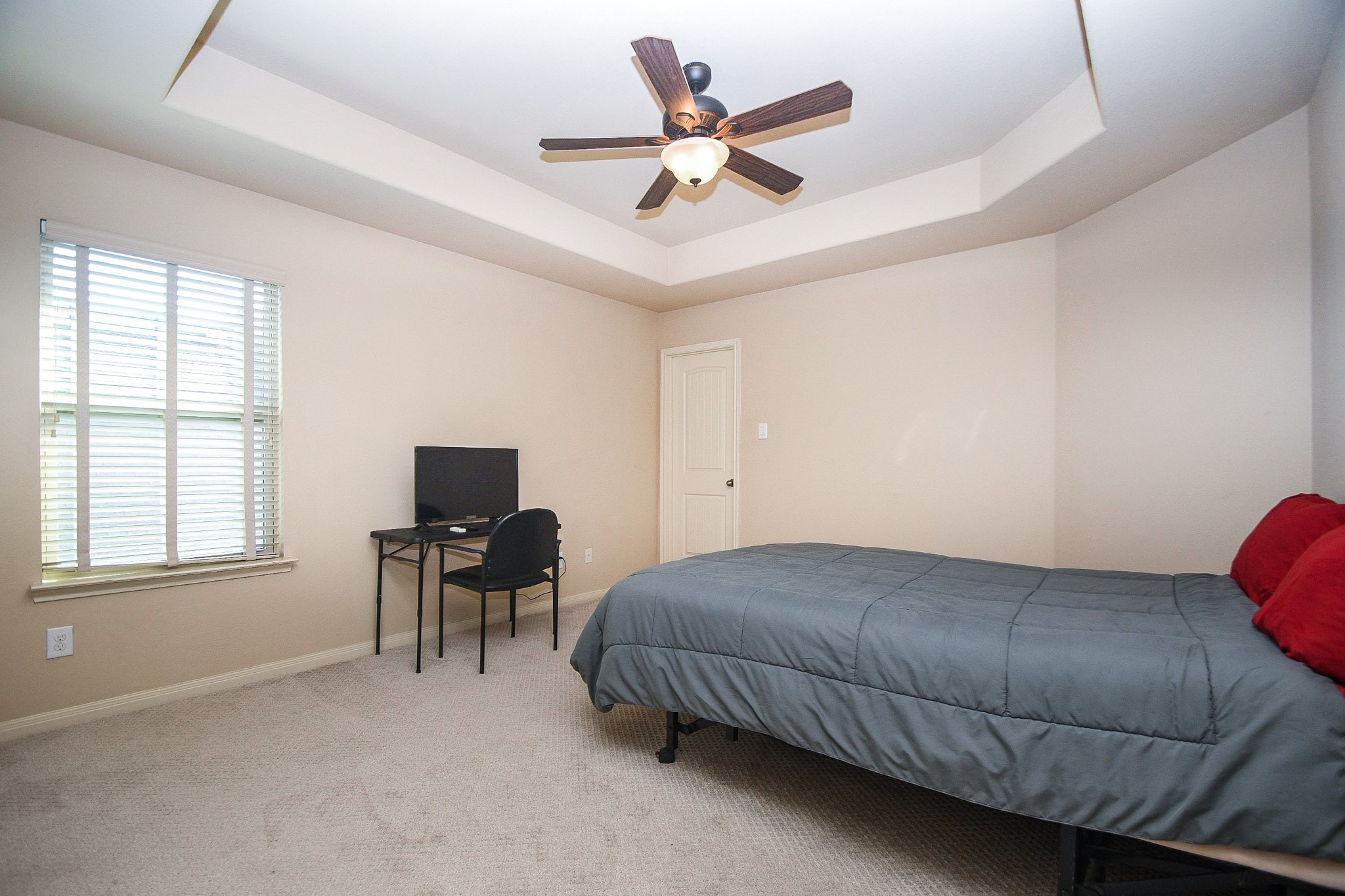 4331 Estes Ridge Lane Katy, TX 77493 - Photo 36 of 42 a bedroom with a bed and a window