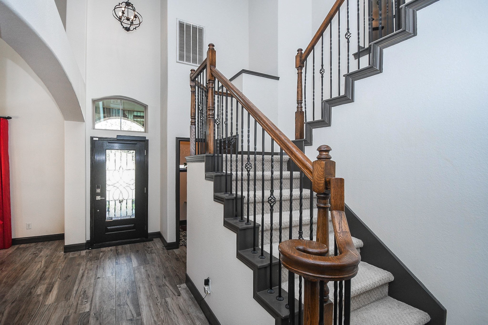 4331 Estes Ridge Lane Katy, TX 77493 - Photo 5 of 42 a view of entryway with wooden floor and stairs