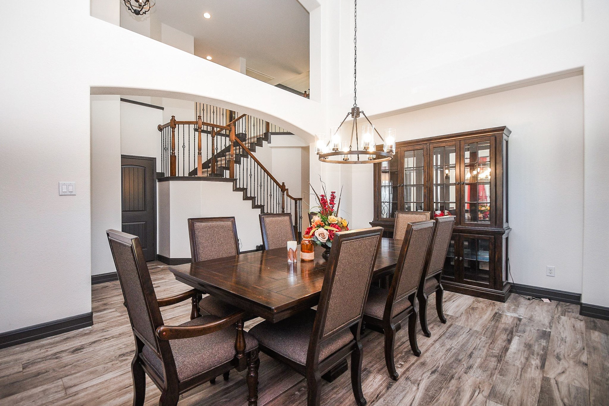 4331 Estes Ridge Lane Katy, TX 77493 - Photo 6 of 42 a view of a dining room with furniture and wooden floor