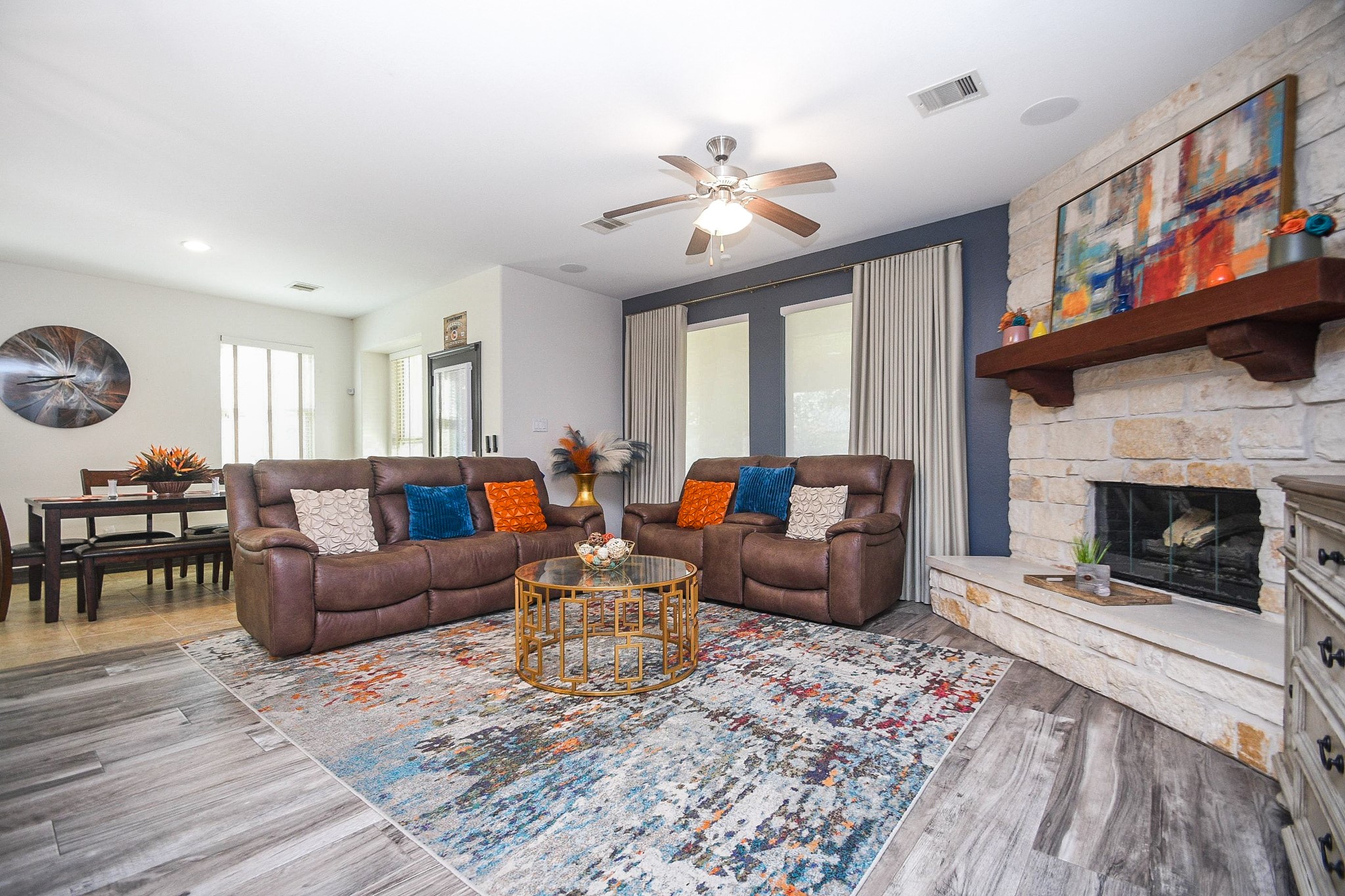 4331 Estes Ridge Lane Katy, TX 77493 - Photo 8 of 42 a living room with furniture a fireplace and a large window