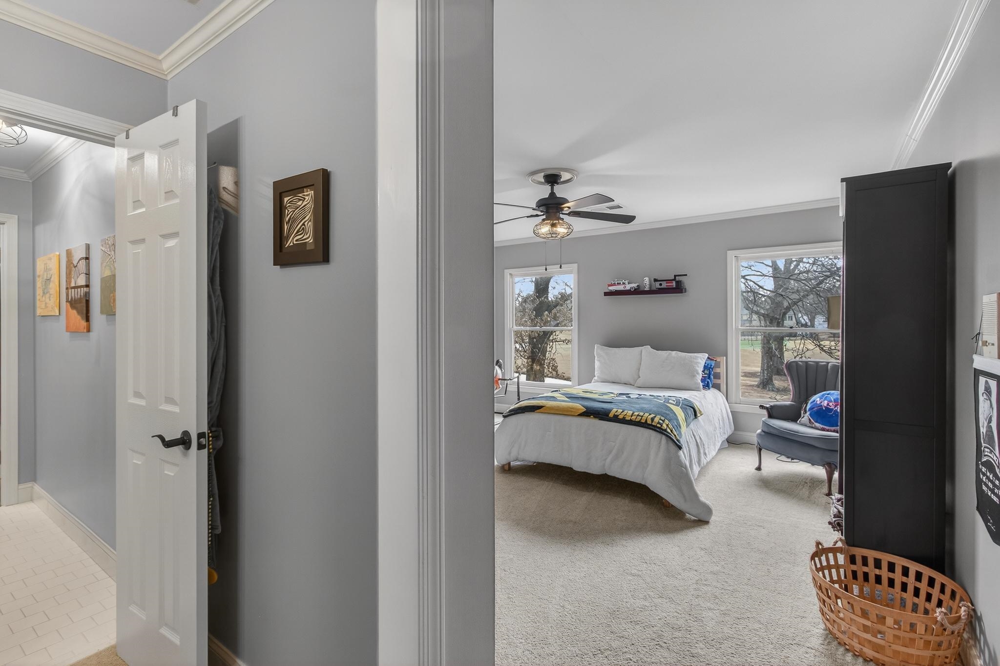 2283 Shrewsbury Run East Collierville, TN 38017 - Photo 11 of 40 a bedroom with a bed and glass walk in closet