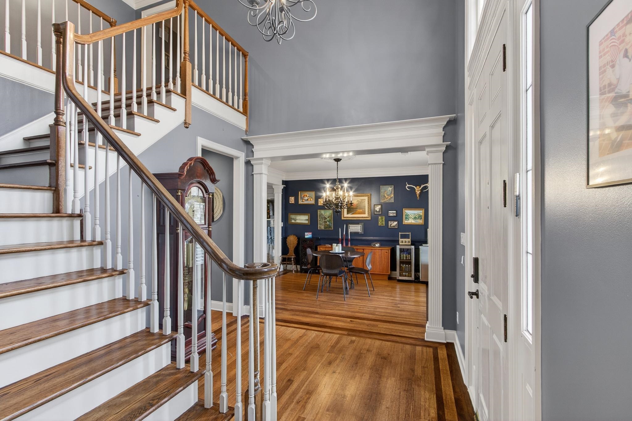 2283 Shrewsbury Run East Collierville, TN 38017 - Photo 28 of 40 a view of staircase with lots of frames on wall and a large window