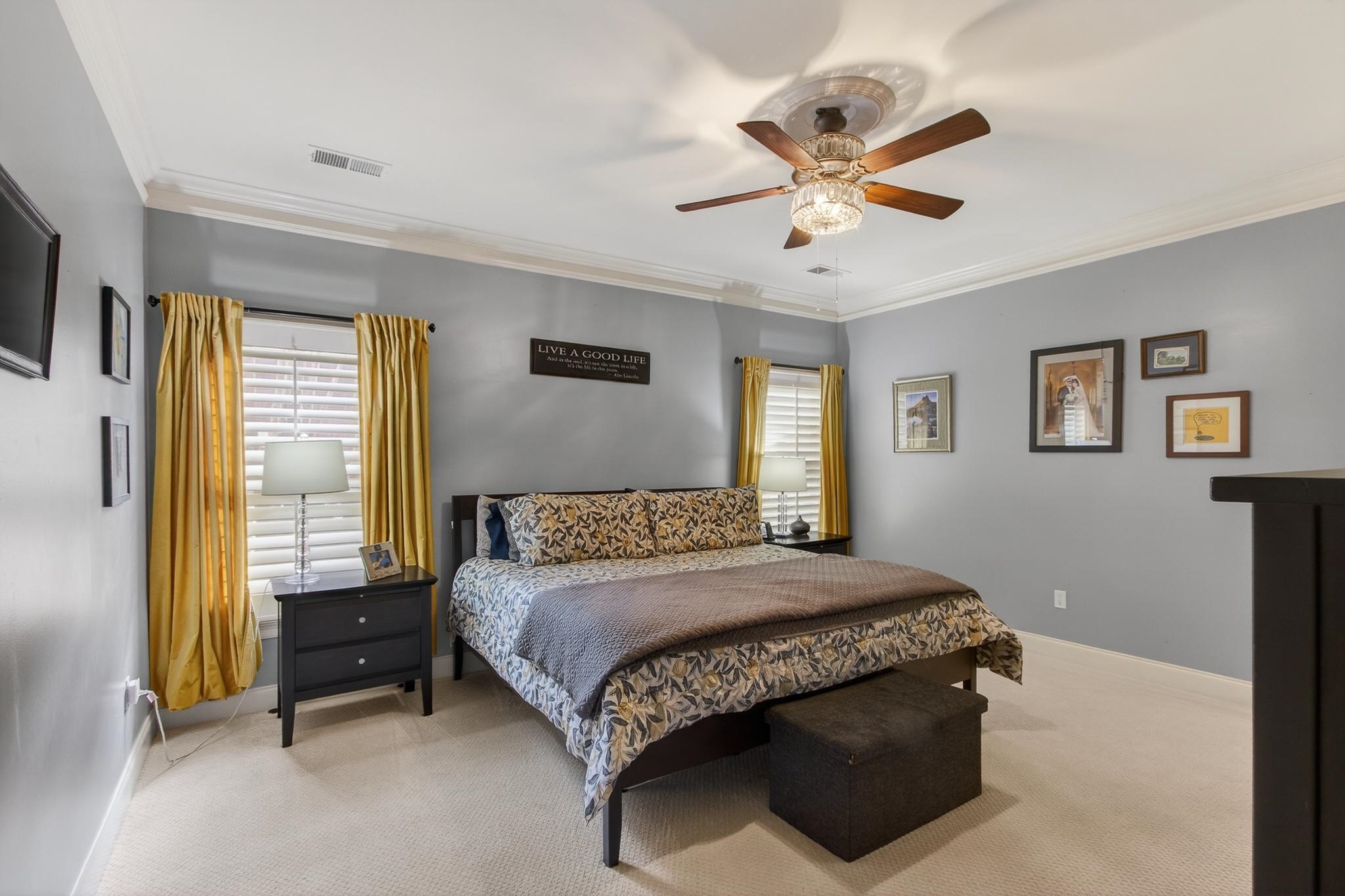 2283 Shrewsbury Run East Collierville, TN 38017 - Photo 39 of 40 a bedroom with a bed and a chandelier