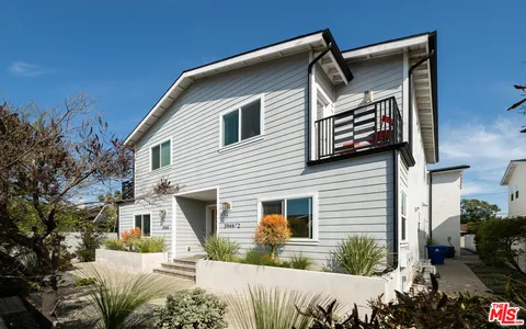a front view of a house with garage
