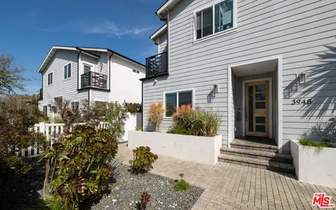 a view of a house with a patio