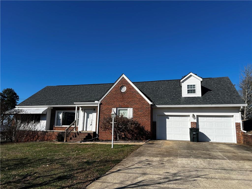 606 Pisgah Way Calhoun, GA 30701 - Photo 2 of 18 a front view of a house with a yard