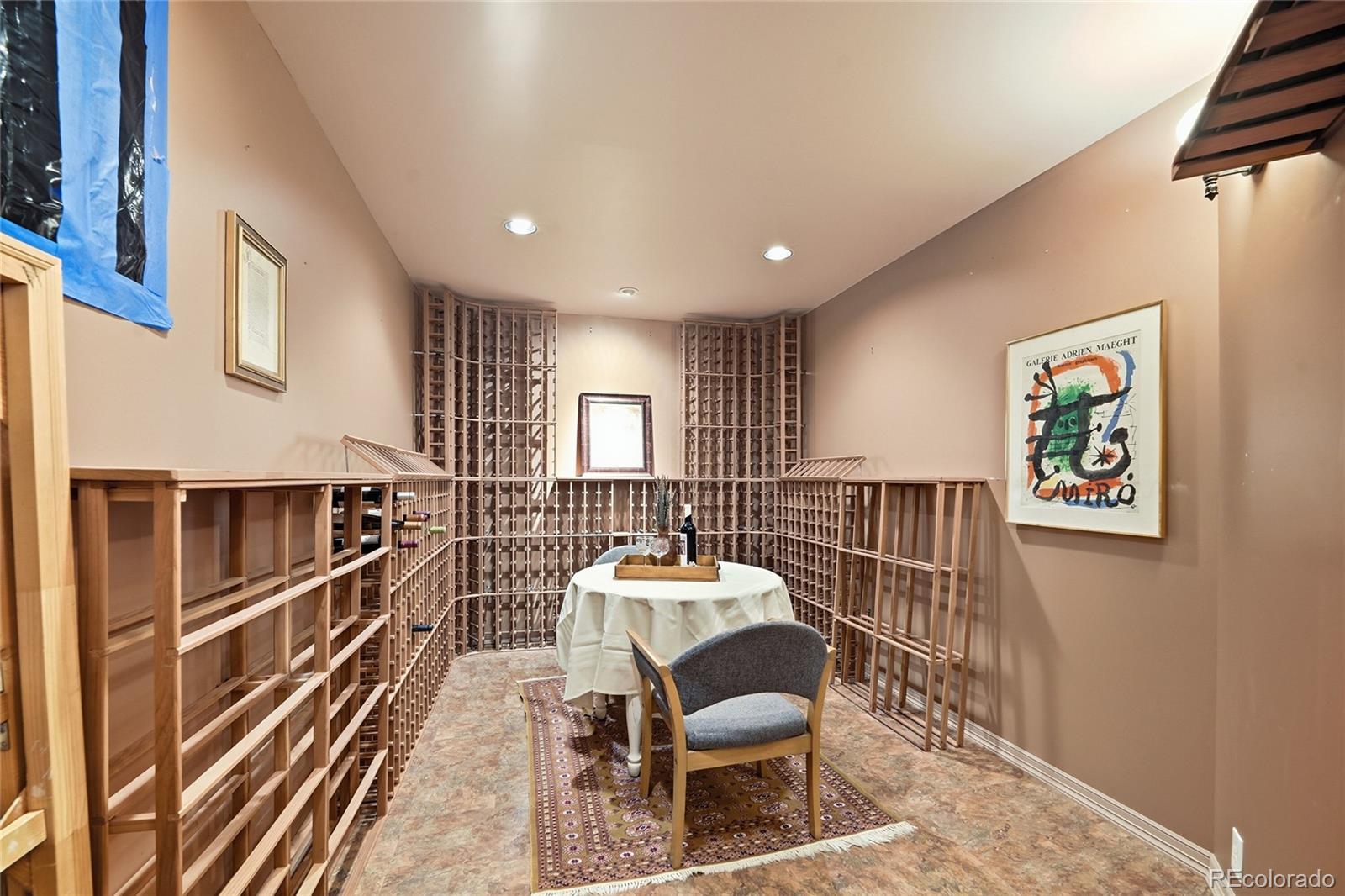 8967 Hunters Way Highlands Ranch, CO 80129 - Photo 37 of 50 a room with furniture